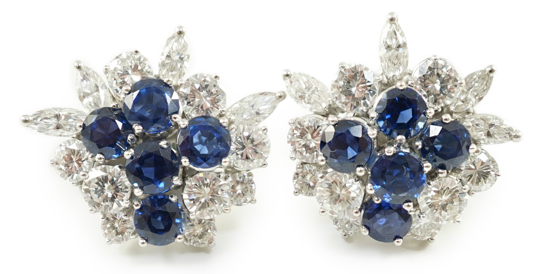 A pair of modern 750 white gold, set sapphire and diamond cluster ear studs